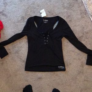 Long sleeve Bebe never worn work out shirt.